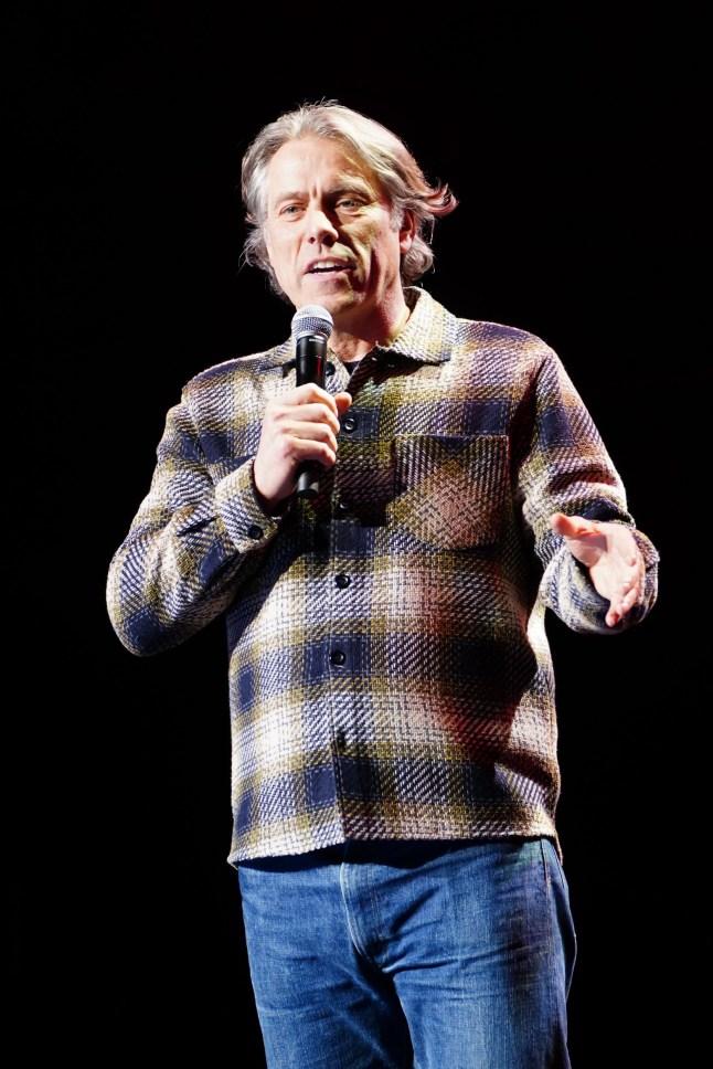 John Bishop on stage during A Night of Comedy, the Teenage Cancer Trust show at the Royal Albert Hall, London. Picture date: Tuesday March 19, 2024. PA Photo. See PA story SHOWBIZ TCT. Photo credit should read: Ian West/PA Wire