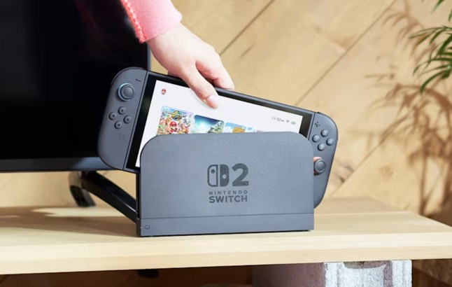 The Nintendo Switch 2 console being placed into a dock.