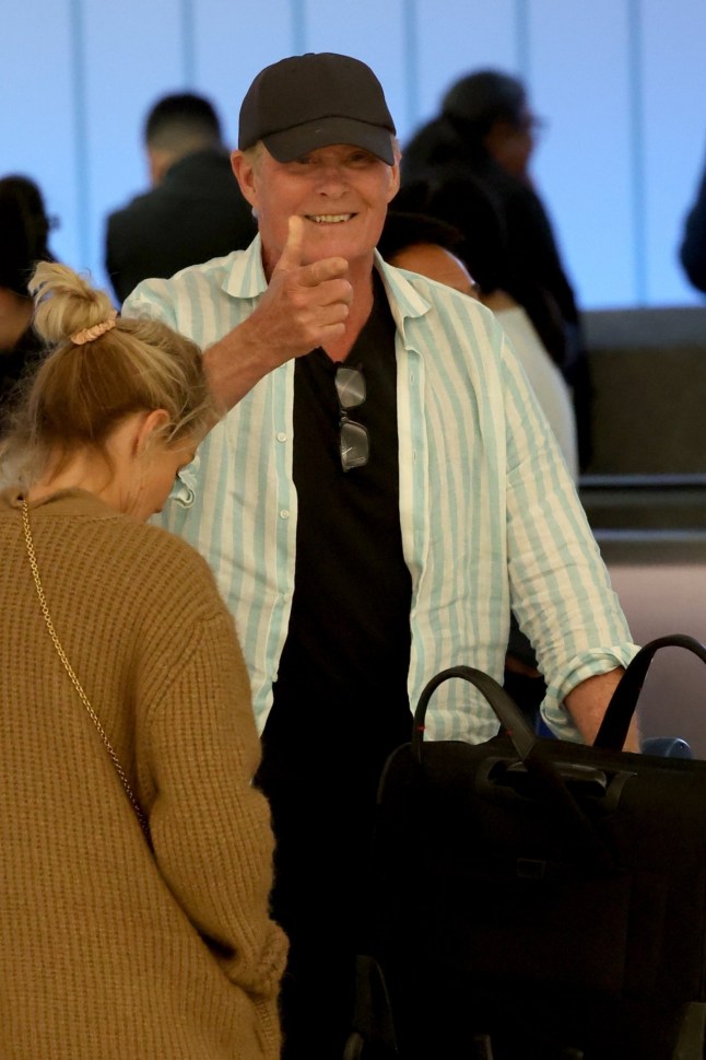 BGUK_3230967 - *PREMIUM-EXCLUSIVE* Los Angeles, CA - *MUST CALL FOR PRICING BEFORE USAGE* *STRICTLY NOT AVAILABLE FOR ONLINE USAGE UNTIL 01:00AM UK TIME ON 08/05/2025* David Hasselhoff is spotted in a wheelchair at LAX. The Hoff was arriving to California from Mexico with his wife Hayley Roberts. Wearing a striped shirt and baseball cap, David was wheeled through the terminal by an airpot worker to where his limo driver was waiting. He then eased out of the chair to walk the rest of the way, leaning heavily on Hayley. The 'Baywatch' star was eager to give the thumbs up and reassure waiting photographers he was okay, explaining that he needed a knee operation. *PICTURES TAKEN ON THE 05/05/2025* Pictured: David Hasselhoff, Hayley Roberts BACKGRID UK 7 MAY 2025 UK: +44 208 344 2007 / uksales@backgrid.com USA: +1 310 798 9111 / usasales@backgrid.com *Pictures Containing Children Please Pixelate Face Prior To Publication*