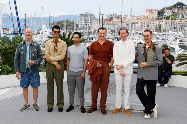 Bill Murray, from left, Richard Ayoade, Riz Ahmed, Rupert Friend, director Wes Anderson and Benedict Cumberbatch pose for photographers at the photo call for the film 'The Phoenician Scheme' at the 78th international film festival, Cannes, southern France, Monday, May 19, 2025. (Photo by Joel C Ryan/Invision/AP)