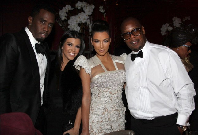 (L-R) Sean "Diddy" Combs, Kourtney Kardashian, Kim Kardashian and Andre Harrell attend Andre Harrell's 50th birthday party at The Darby restaurant on October 16, 2010 in New York City.