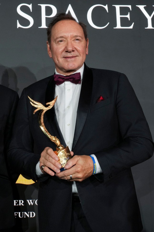 Kevin Spacey receives the Excellence in Film and Television award during the Better World Fund 10th Anniversary Gala Dinner during the 78th international film festival in Cannes, southern France, Tuesday, May 20, 2025. (AP Photo/Natacha Pisarenko)